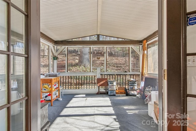 sunroom / solarium with lofted ceiling