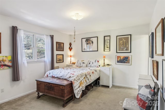 bedroom featuring light colored carpet