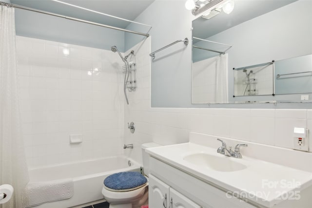 full bathroom featuring shower / bath combo, vanity, backsplash, toilet, and tile walls