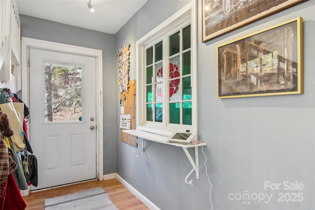 doorway featuring light hardwood / wood-style flooring