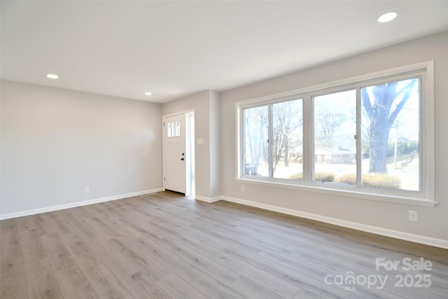 entrance foyer featuring light hardwood / wood-style flooring