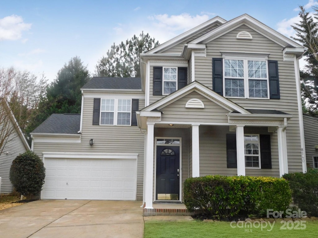 view of front of property featuring a garage