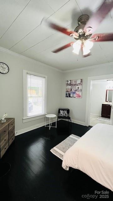 bedroom with ceiling fan and ornamental molding