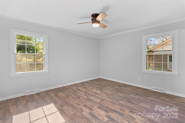 unfurnished room with dark wood-type flooring, ceiling fan, and crown molding