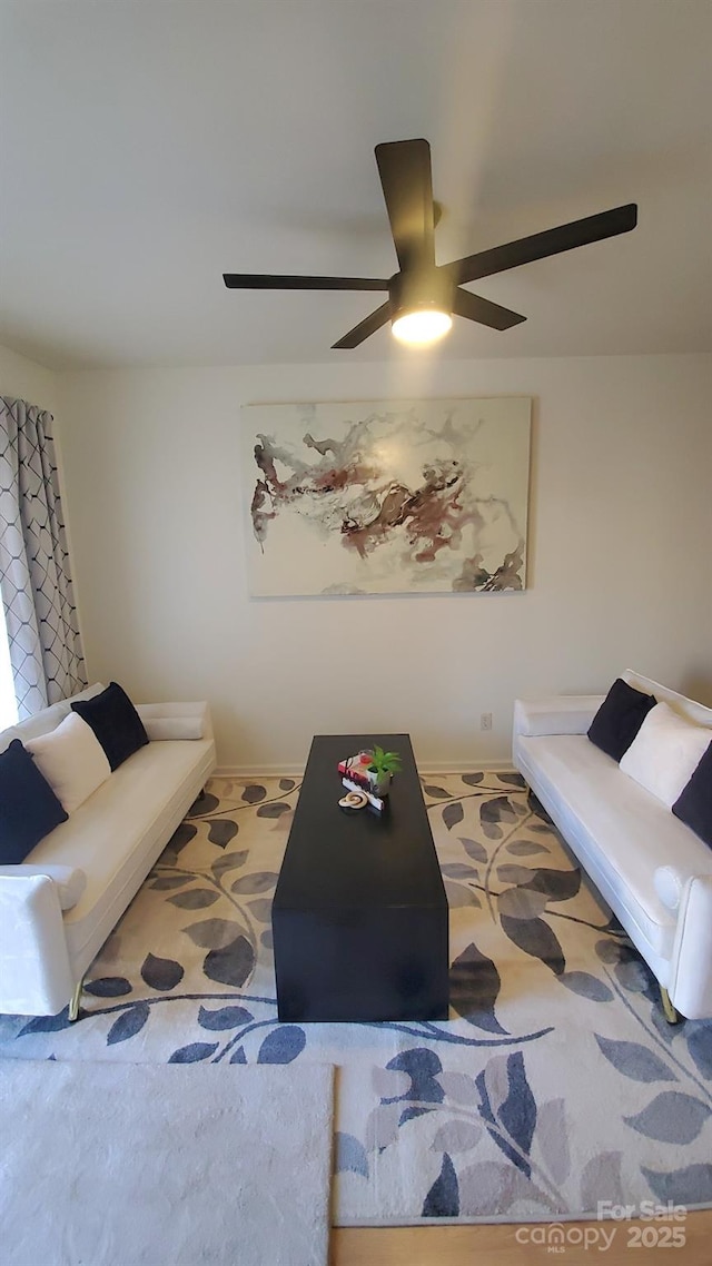 living room with ceiling fan