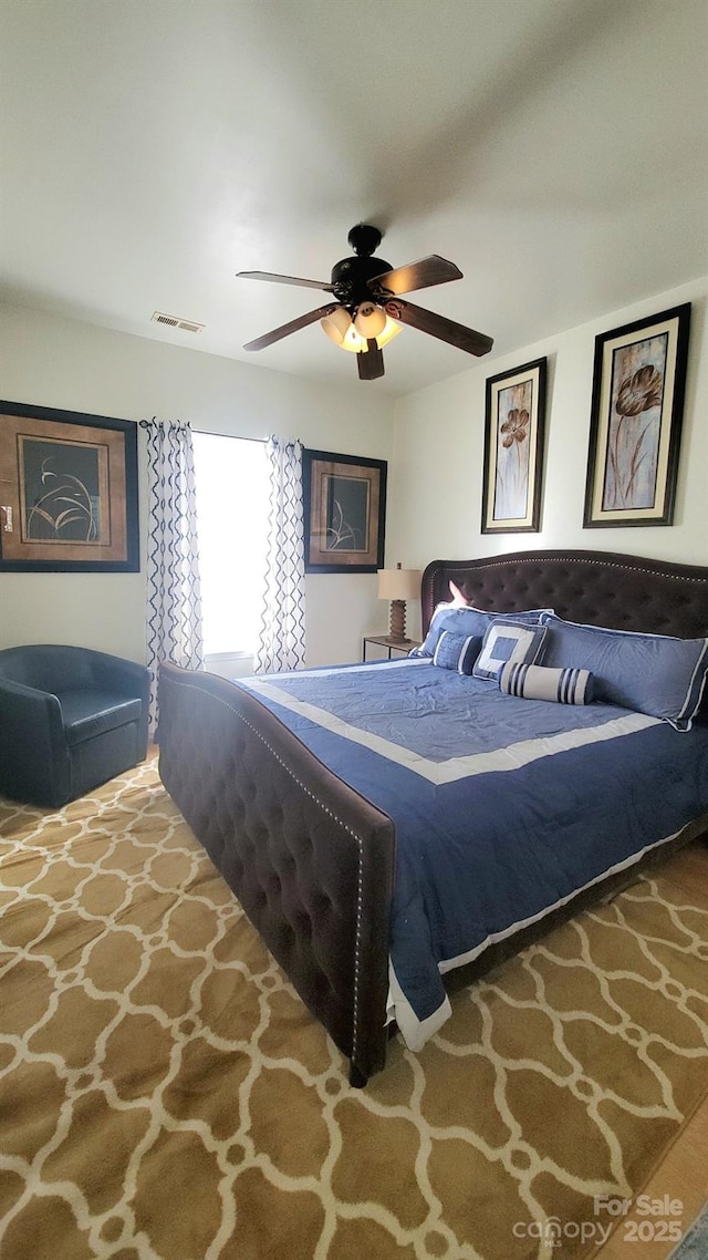 bedroom featuring ceiling fan