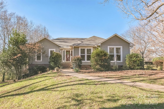 ranch-style home with a front yard