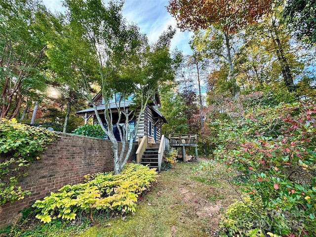 view of yard with a deck