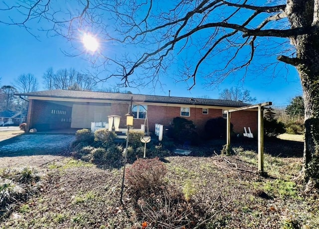 exterior space featuring a carport