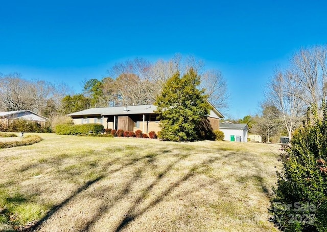 exterior space with a yard