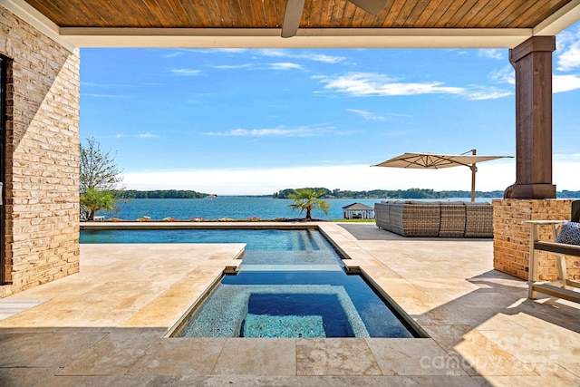 view of swimming pool with ceiling fan, an outdoor hangout area, a patio area, an in ground hot tub, and a water view