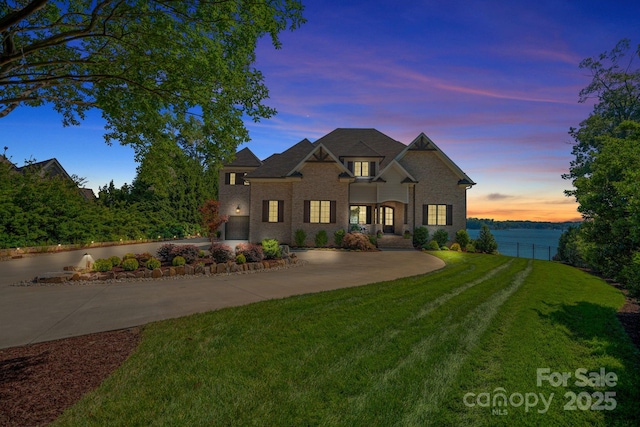 french country home with a yard