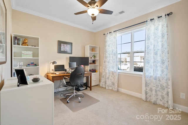 home office with ceiling fan, light colored carpet, and crown molding