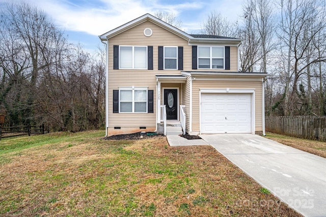 front facade featuring a garage and a front yard