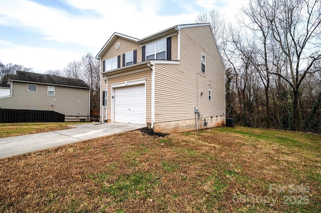 view of home's exterior with central air condition unit, a yard, and a garage