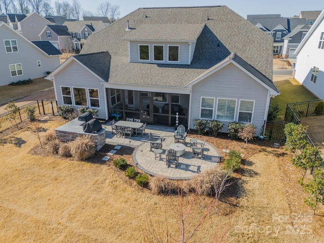 back of property with a patio area