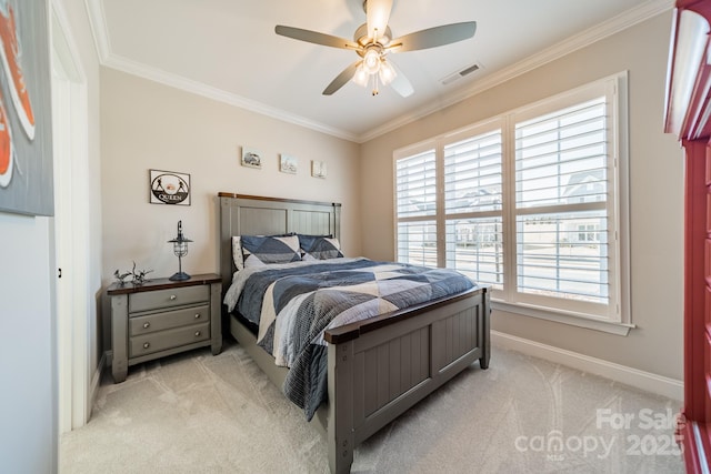 bedroom featuring light carpet, ceiling fan, crown molding, and multiple windows