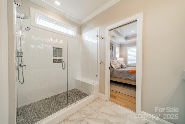 bathroom featuring walk in shower and ornamental molding