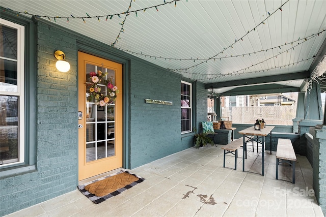 view of patio featuring a porch