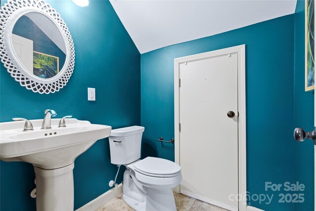 bathroom featuring toilet