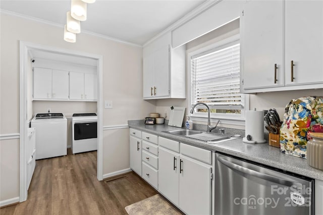 kitchen with dishwasher, washing machine and dryer, white cabinetry, and sink