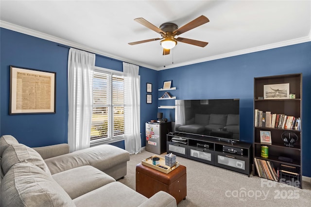 living room featuring ceiling fan, carpet floors, and crown molding