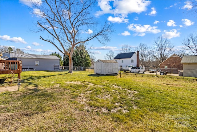 view of yard with a storage unit