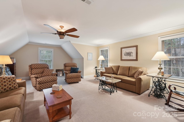 living room featuring light colored carpet, crown molding, a wealth of natural light, and lofted ceiling