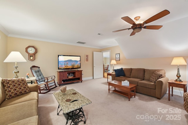 living room featuring light carpet, ceiling fan, and ornamental molding