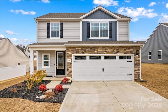 front of property with a garage