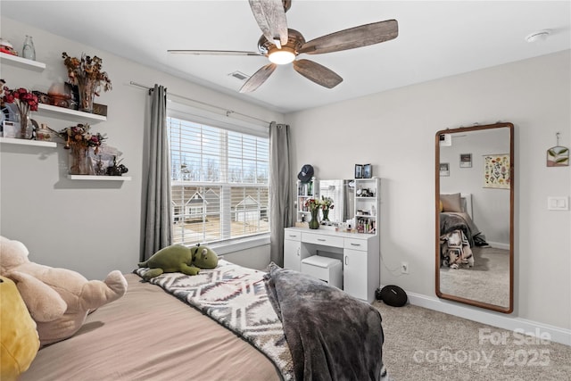 bedroom featuring ceiling fan and carpet floors