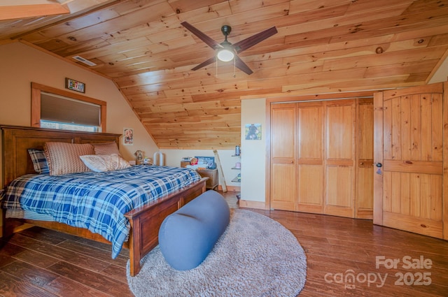 bedroom featuring ceiling fan, dark wood-type flooring, wood ceiling, and vaulted ceiling