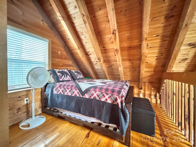 bedroom featuring vaulted ceiling with beams, wooden walls, wooden ceiling, and wood-type flooring