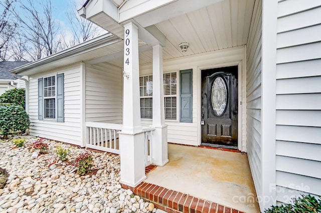 property entrance with a porch