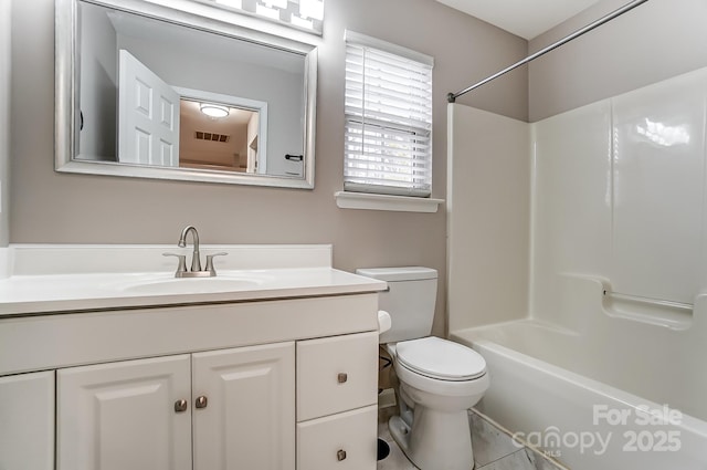 full bathroom with bathtub / shower combination, vanity, toilet, and tile patterned flooring