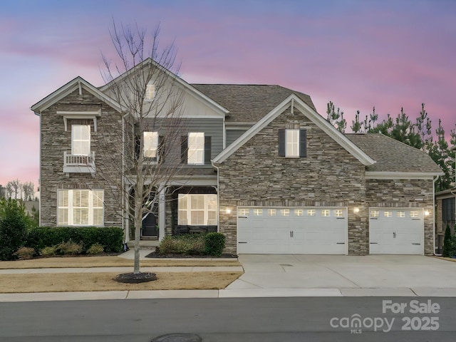 front of property featuring a garage