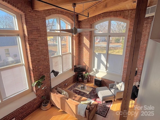 sunroom / solarium with beamed ceiling and wood ceiling