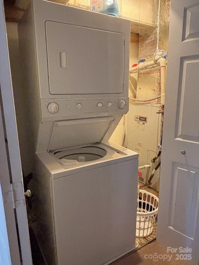 201 S Hoskins Rd Unit 136, Charlotte, NC 28208 - washroom with stacked washer / drying machine