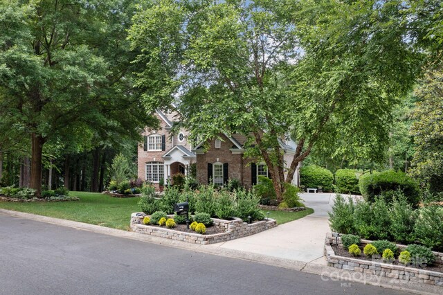 view of front of property with a front lawn