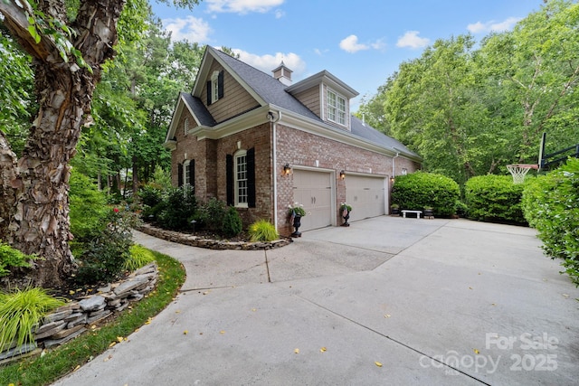 view of side of property featuring a garage