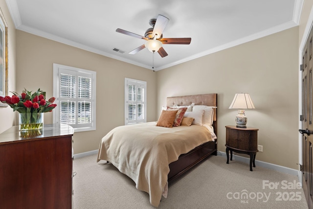 bedroom with light carpet, ceiling fan, and crown molding