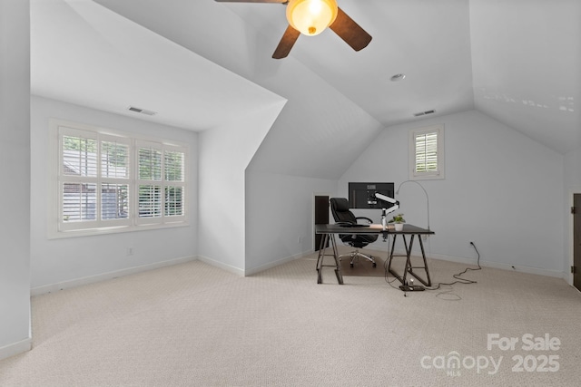 carpeted office featuring ceiling fan, lofted ceiling, and a wealth of natural light