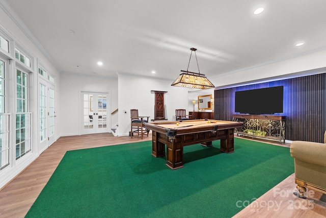 recreation room featuring hardwood / wood-style flooring, french doors, billiards, and ornamental molding