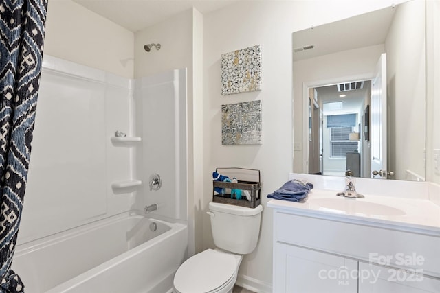 full bathroom featuring bathing tub / shower combination, vanity, and toilet