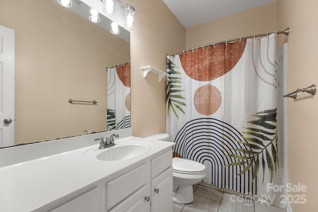 bathroom featuring tile patterned flooring, a shower with curtain, vanity, and toilet