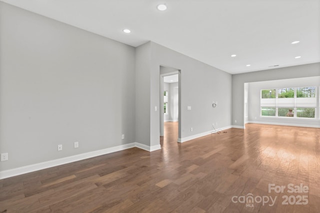 253 Stone Mountain Way, Denver, NC 28037 - spare room with wood finished floors, recessed lighting, and baseboards