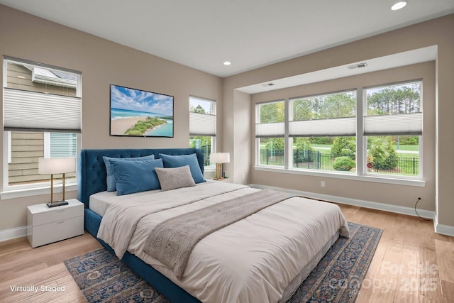 253 Stone Mountain Way, Denver, NC 28037 - bedroom with baseboards, light wood-style flooring, and recessed lighting