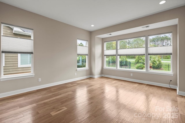 253 Stone Mountain Way, Denver, NC 28037 - unfurnished room with wood-type flooring, baseboards, and recessed lighting