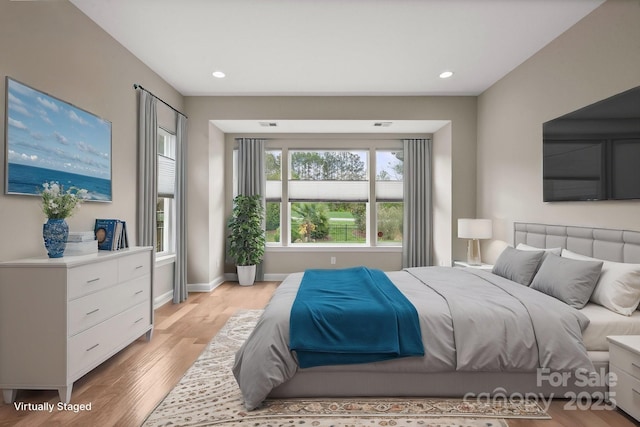 253 Stone Mountain Way, Denver, NC 28037 - bedroom with light wood-style flooring, baseboards, and recessed lighting