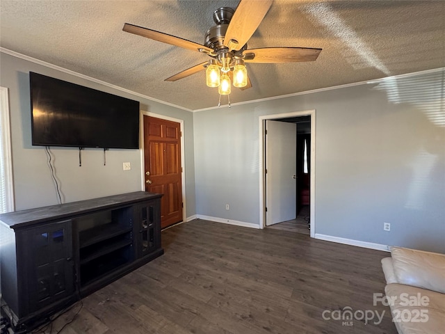 unfurnished living room with dark hardwood / wood-style flooring, ornamental molding, and a textured ceiling